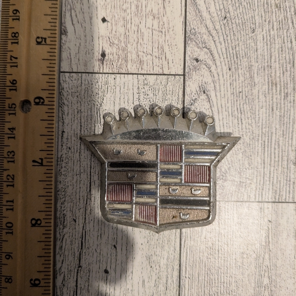 Cadillac Silver and Red Car Emblem